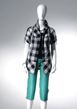 Fashion clothing on mannequin on light background