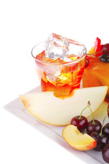 fruit icecream and beverage on plate