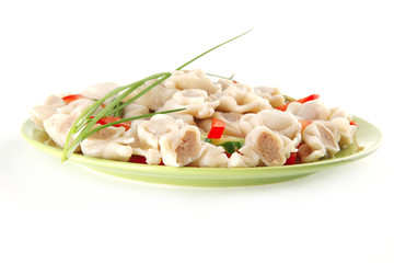 dumplings served on green plate