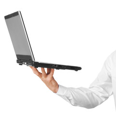 The laptop on a hand of the businessman