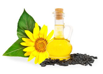 Small bottle with sunflower-seed oil and sunflower seeds