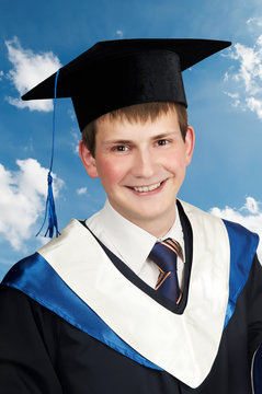 happy smiley graduate boy