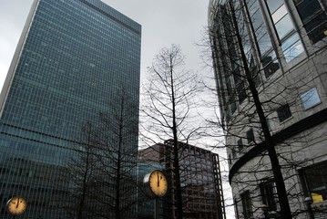 Canary Wharf, London, towards Grime Street, showing clocks