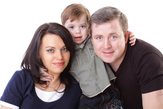 Happy family. Father, mother and boy. Over white background