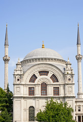 Fototapeta na wymiar Ornate mosque with blue sky