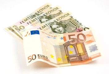 Obraz na płótnie Canvas swedish kronor and euro notes