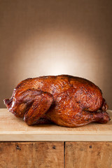 homemade smoked whole chicken on wood