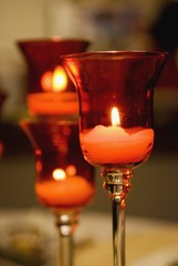 Candles Lit In A Glass Candle Holder