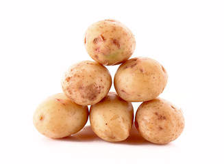 Few potatoes isolated on white
