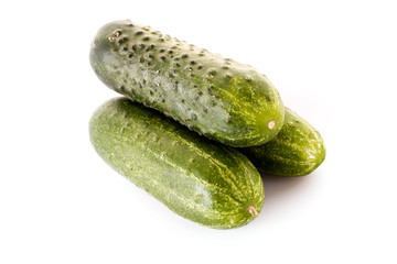 Three cucumbers isolated on white