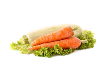 Vegetarian marrow, carrots and green salad isolated on white