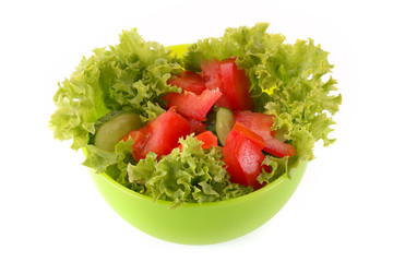 tomatoes and salad isolated on white