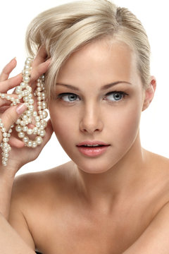 Beautiful blonde girl with Pearl beads
