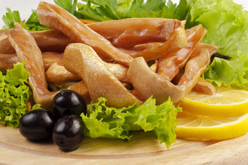 A composition with smoked salmon bellies