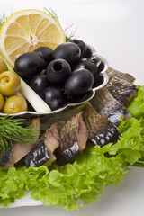 A composition with smoked herring pieces