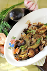 Fried aubergines with mushrooms