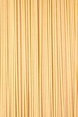 Raw spaghetti in close up background