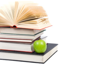 book stack with apple isolated on white background