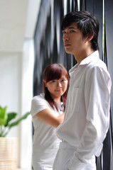 Young Asian Couple in despair over certain issues 4