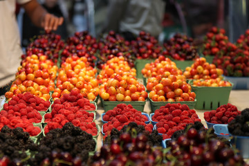 Fruit market selling sweet berries at a food market