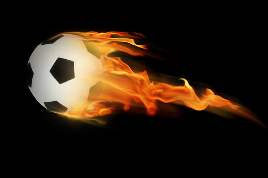 an image of a soccerball on fire