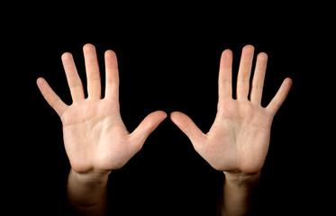 Hands isolated on black background