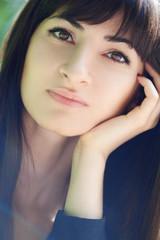 Fototapeta premium young beautiful girl with long black hair