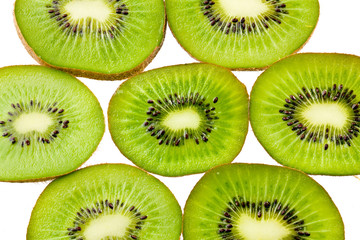 Fototapeta premium Fresh sliced kiwi fruit isolated on white