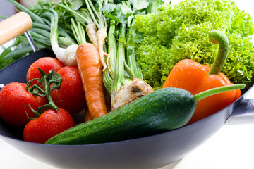 Fresh organic vegetables isolated on white