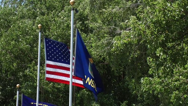US and Kansas State Flags in the breeze