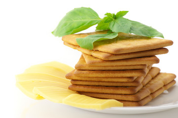 Crackers, cheese and basil