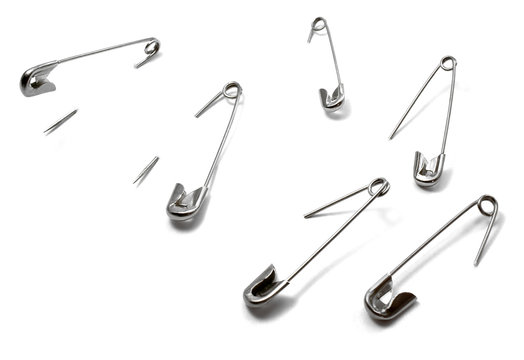 open safety pin in white background
