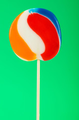 Colourful lollipop against the colourful background