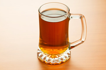 Beer glass on the wooden table