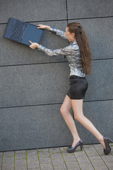 woman destroys laptop