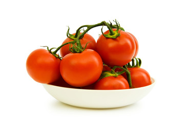 Red tomatoes isolated on the white background