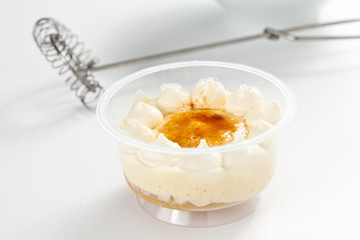 cup of whiskey cake with cream