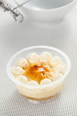 cup of whiskey cake with cream