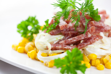 Salad with salami and sweetcorn
