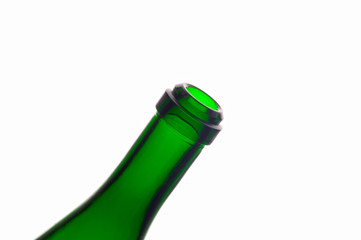 Empty green glass bottle isolated on white background