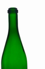 Empty green glass bottle isolated on white background