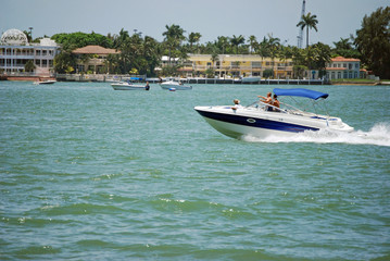 Blue and White Motor Boat