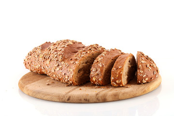 Bread with sunflower seeds isolated on white