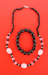 beads on red background