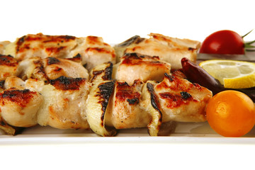 roast shish kebab on white