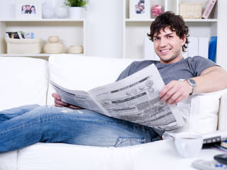 Handsome guy with newspaper
