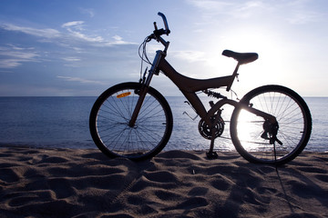Fototapeta premium Silhouette of a Bike on the Beach