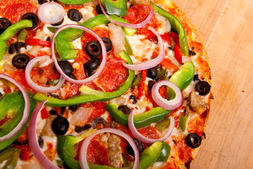 Pizza with vegetables and pepperoni