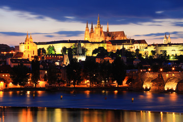 Obraz na płótnie Canvas Colorful Prague gothic Castle with Charles Bridge in the Night