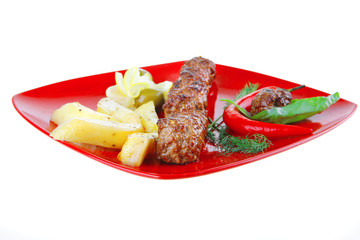 beef meatballs on red plate